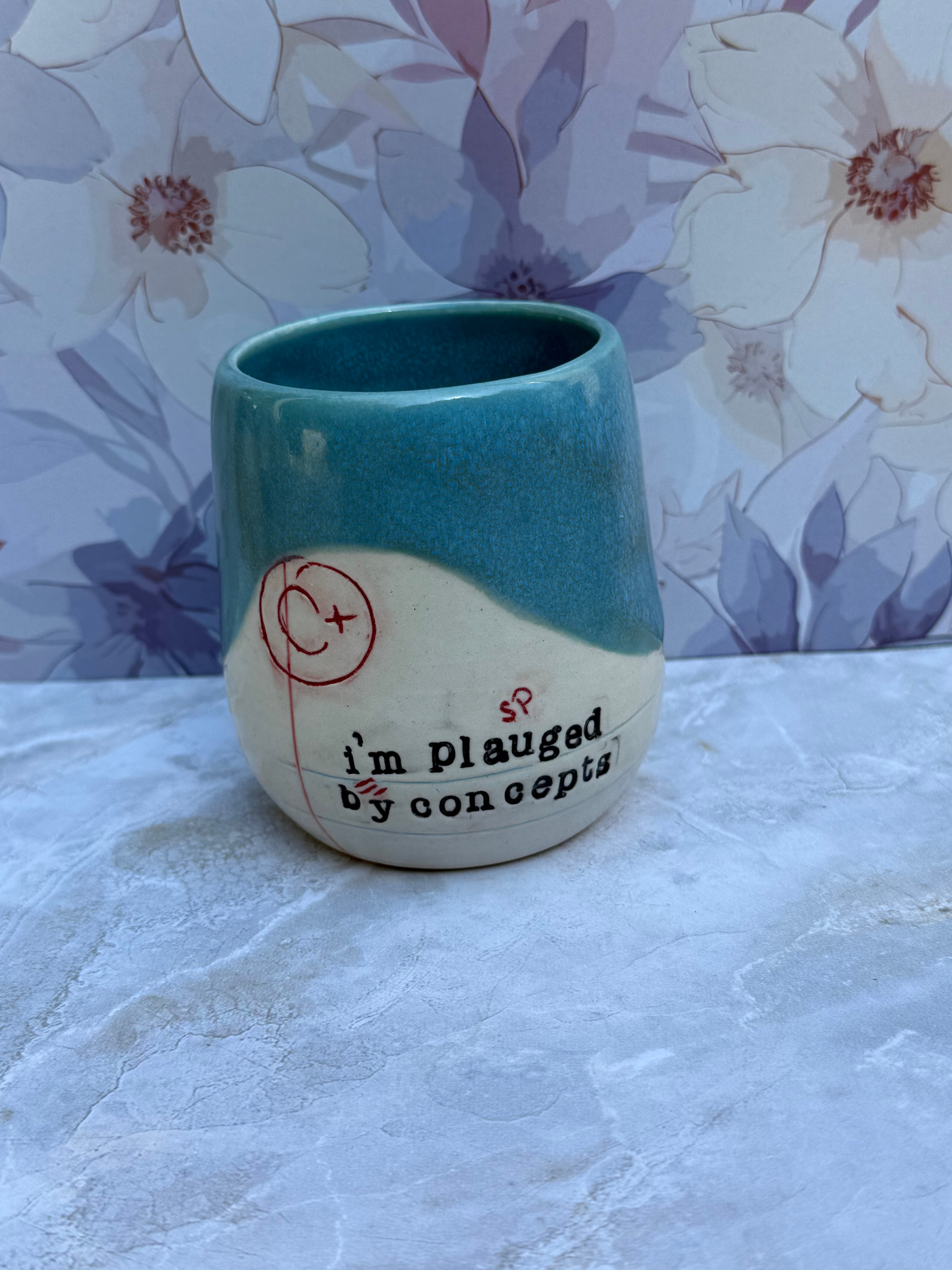Typo Tumbler - plauged by concepts